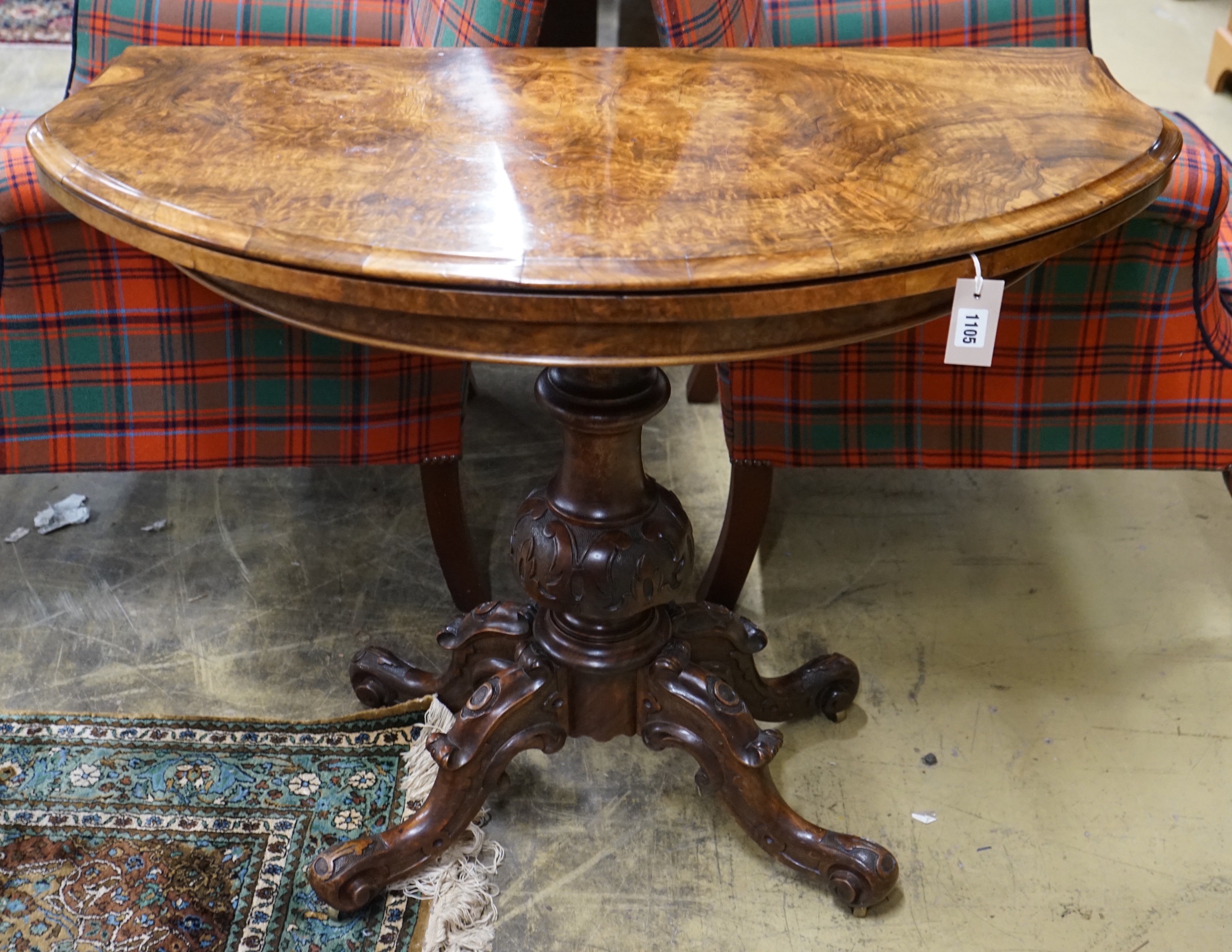 A Victorian figured walnut D shaped folding card table, width 98cm, depth 46cm, height 75cm
